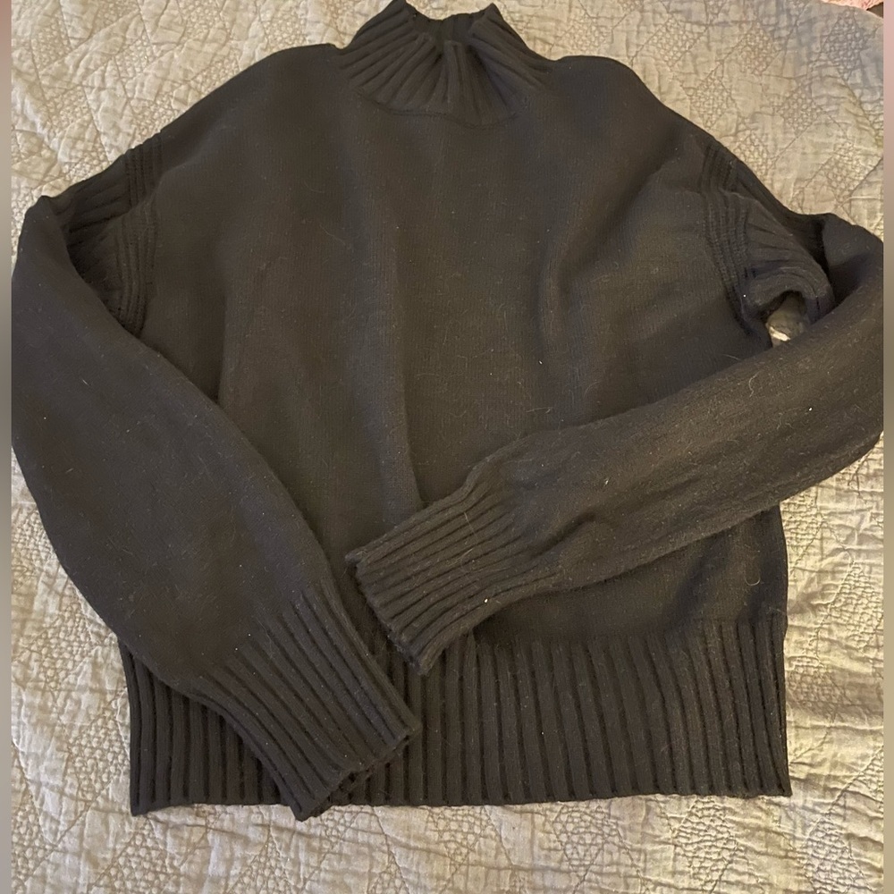 Black sweater with neck. Size Medium.
